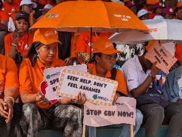 Women participating in a public campaign against gender-based violence